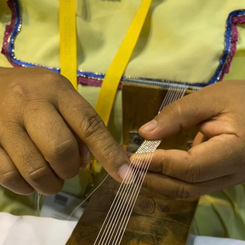 Elaborazione Collana Embera Media fatto a mano con simboli tradizionali indigeni Colombia