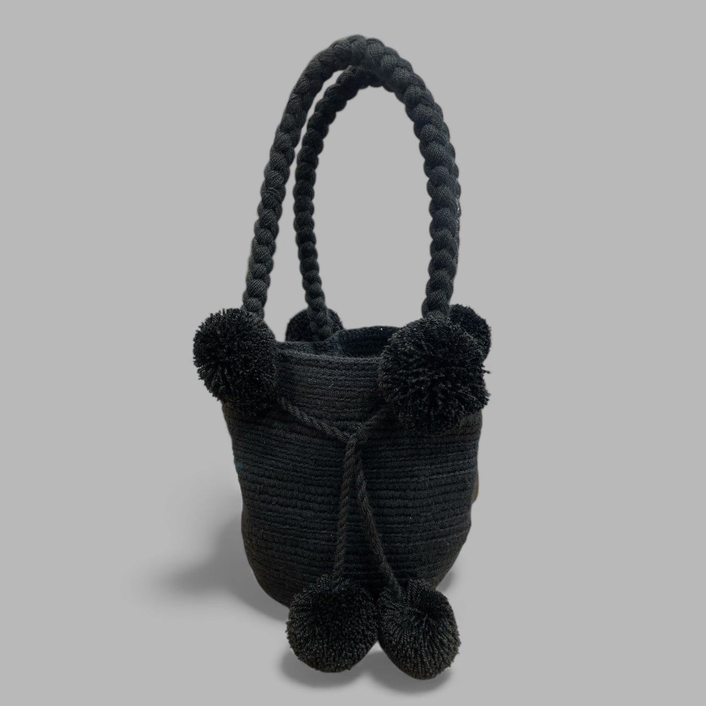 Mini mochila Wayuù nera con manico intrecciato borsa compatta resistente